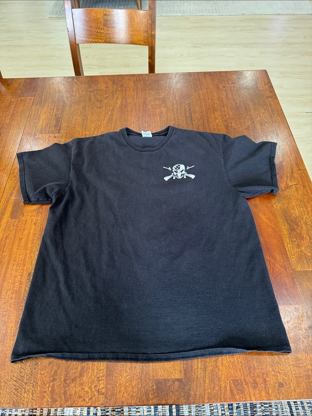 Black Graphic Men’s T-Shirt with Small Chest Skull Design Large Design on Back